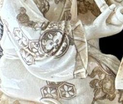Chinese Carving in its display case: Analysis of Decorative Motifs